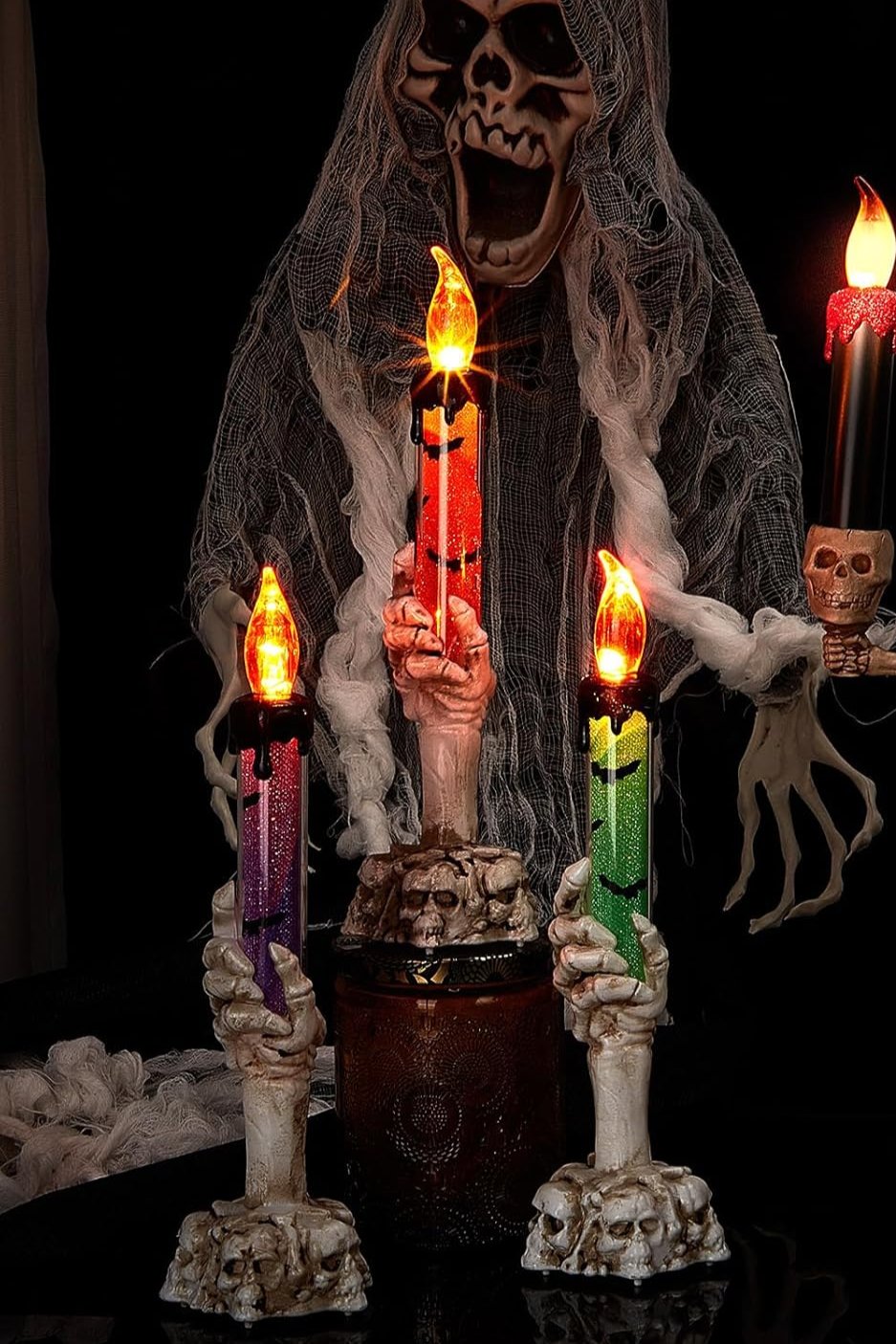 Lámpara de vela con forma de mano fantasma LED alimentada por energía solar